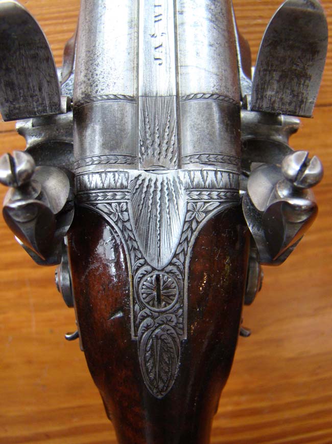 A fine pair of Double Barreled English Flintlock Coach Pistols by James Wilkinson, London, circa 1810, Gunmaker to His Majesty King George III. — image 2